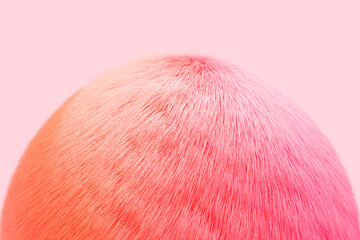 3d illustration  orange and pink fluffy ball on yellow  isolated background. fur pompon - obrazy, fototapety, plakaty