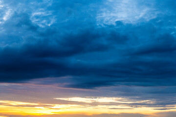 Naklejka na ściany i meble dramatic cloud at sunset nature background