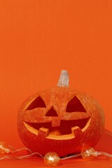 halloween pumpkin lantern on orange background