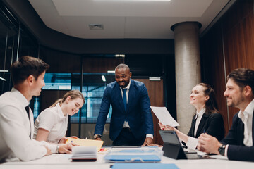 Businessman and businesswoman team at office meeting. Business people men and women group...