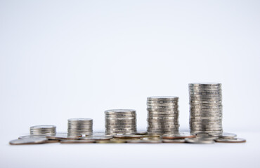 Coin stack on white background for finance and business money saving ideas. with copy space and...