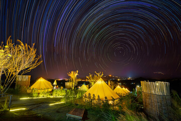 Night sky star trail over the Dome tents in resort on Mon Keing Dao at north of Thailand. - 458659155
