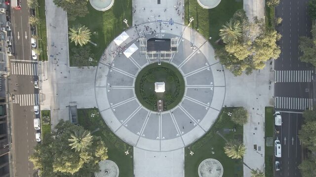 Aerial Drone top view of May Square, Buenos Aires Argentina. Flying up Plaza de Mayo, Government House, Casa Rosada, May Pyramid, Cabildo, Cathedral.