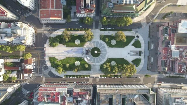 Aerial Drone top view of May Square, Buenos Aires Argentina. Flying down Plaza de Mayo, Government House, Casa Rosada, May Pyramid, Cabildo, Cathedral.