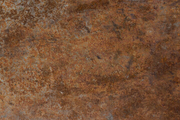 The texture of a rusty metal wall with scratches and defects. Background.
