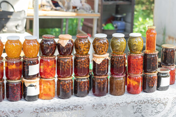 Jam with cones, nuts and honey are sold on the local market. Useful and healing natural sweets and dietary supplements