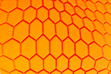 Orange hexagon pattern background Is a rubber decorated closeup.Orange hexagon abstract background...
