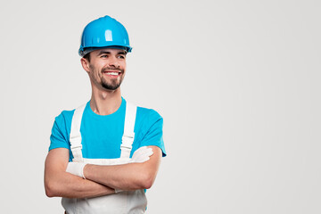 Confident foreman construction man in overall and hardhat