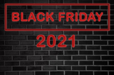 black friday red neon on black block wall. copy space