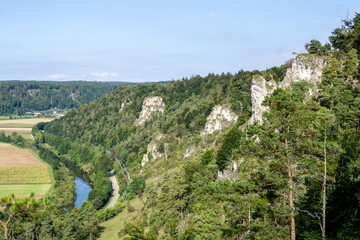 view over rocks of arnsberger leite and river altmühl