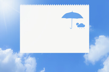 リングノート、ルーズリーフの白い文字入れスペースと雨、晴れの天気の手書きアイコン/青空背景画像
