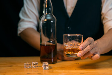 Barman pouring whiskey whiskey glass beautiful night