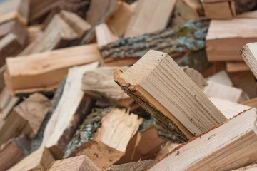 Rolgordijnen Chopped oak wood firewood © PHOTOEURO