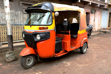 Fototapeta premium An Indian Auto Rickshaw (Tuk-Tuk) on road.