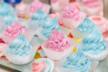 cupcakes with pink frosting and sprinkles