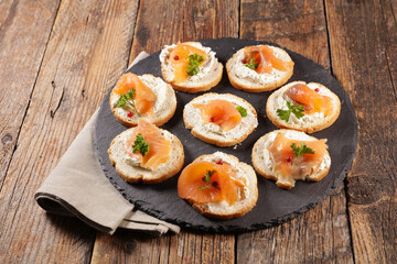 canape with cream and smoked salmon- buffet food,  snack
