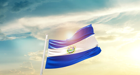 El Salvador national flag cloth fabric waving on beautiful sky - Image