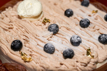 Closeup of a delicious blueberry cream cake