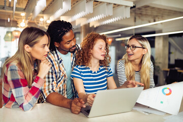 Group of diverse designers, business people brainstorming on meeting in office