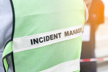close up text incident manager on shirt