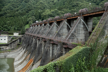 Fototapeta na wymiar Old lock near the hydroelectric power plant