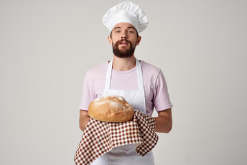 a man in a chef's uniform fresh bread cooking baking