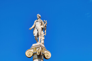 god Apollo, statue in the center of Athens.