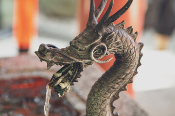Dragon water services at Japanese shrines and temples