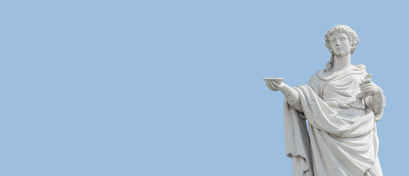 Old Roof Statue Of A Beautiful Renaissance Era Woman Philosopher And Poet With A Tea Cup Or Food Plate In Potsdam At White Blue Sky Background And Copy Space, Germany.