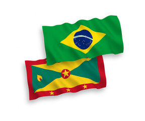 National vector fabric wave flags of Brazil and Grenada isolated on white background. 1 to 2 proportion.