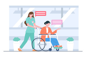 Obraz na płótnie Canvas Nurses treating patients by wheelchair