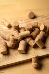 Bunch of wine corks on wooden table