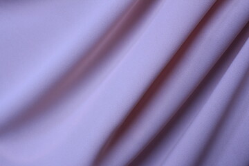 Fototapeta premium Draped pink silky fabric background