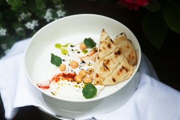 Traditional labne cheese with chickpea and pita bread