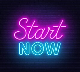 Start now neon sign on brick wall background.