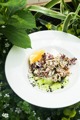 Roasted seafood with lemon and green sauce