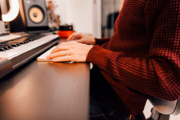 Only hands concept of music producer working at home studio