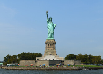 Fototapeta premium Statue of Liberty, colossal neoclassical sculpture on Liberty Island in New York Harbor within New York City, in United States