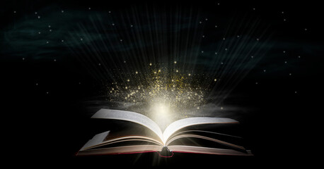 Book With Open Pages And Abstract Lights Shining In Darkness