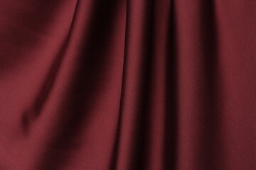 Obraz premium Draped vinous silk fabric background