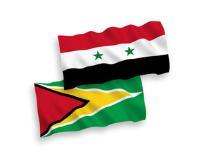 National vector fabric wave flags of Co-operative Republic of Guyana and Syria isolated on white background. 1 to 2 proportion.