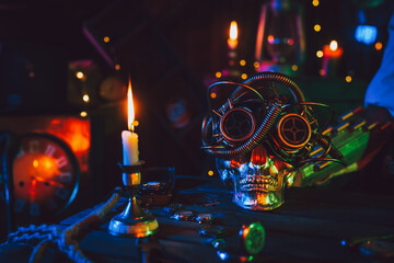 Cyberpunk atmosphere. Skull in steampunk glasses on a table