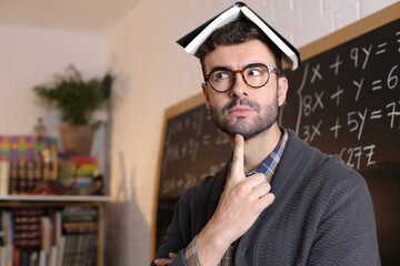 Math teacher with a puzzled expression