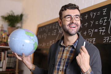 Cute geographer showing the world