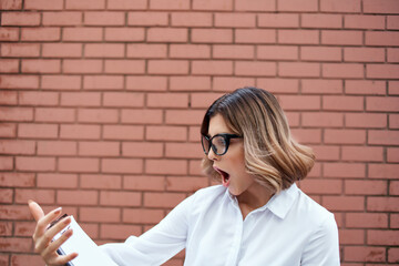 woman in suit outside official job success work light background