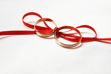 Two golden wedding rings background concept