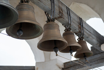 Fototapeta premium large Church bells. row of bells on the church bell tower