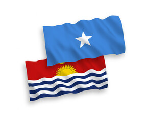 National vector fabric wave flags of Republic of Kiribati and Somalia isolated on white background. 1 to 2 proportion.