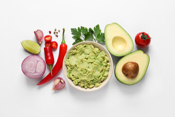 Fresh ingredients for guacamole on white background, flat lay