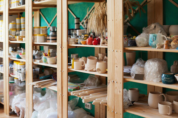 shelf with pottery at art studio